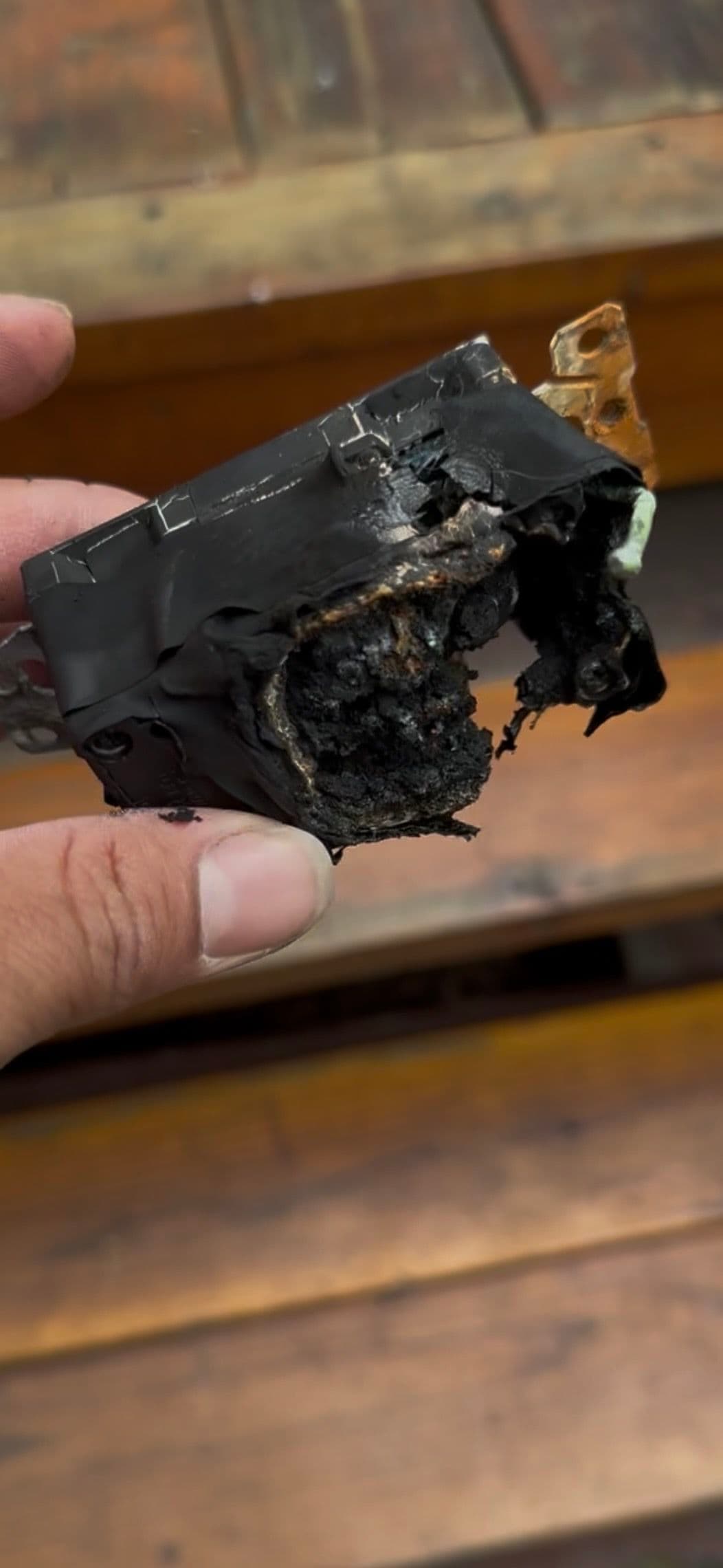 A Melted Outlet Was Cutting Power to Multiple Rooms image